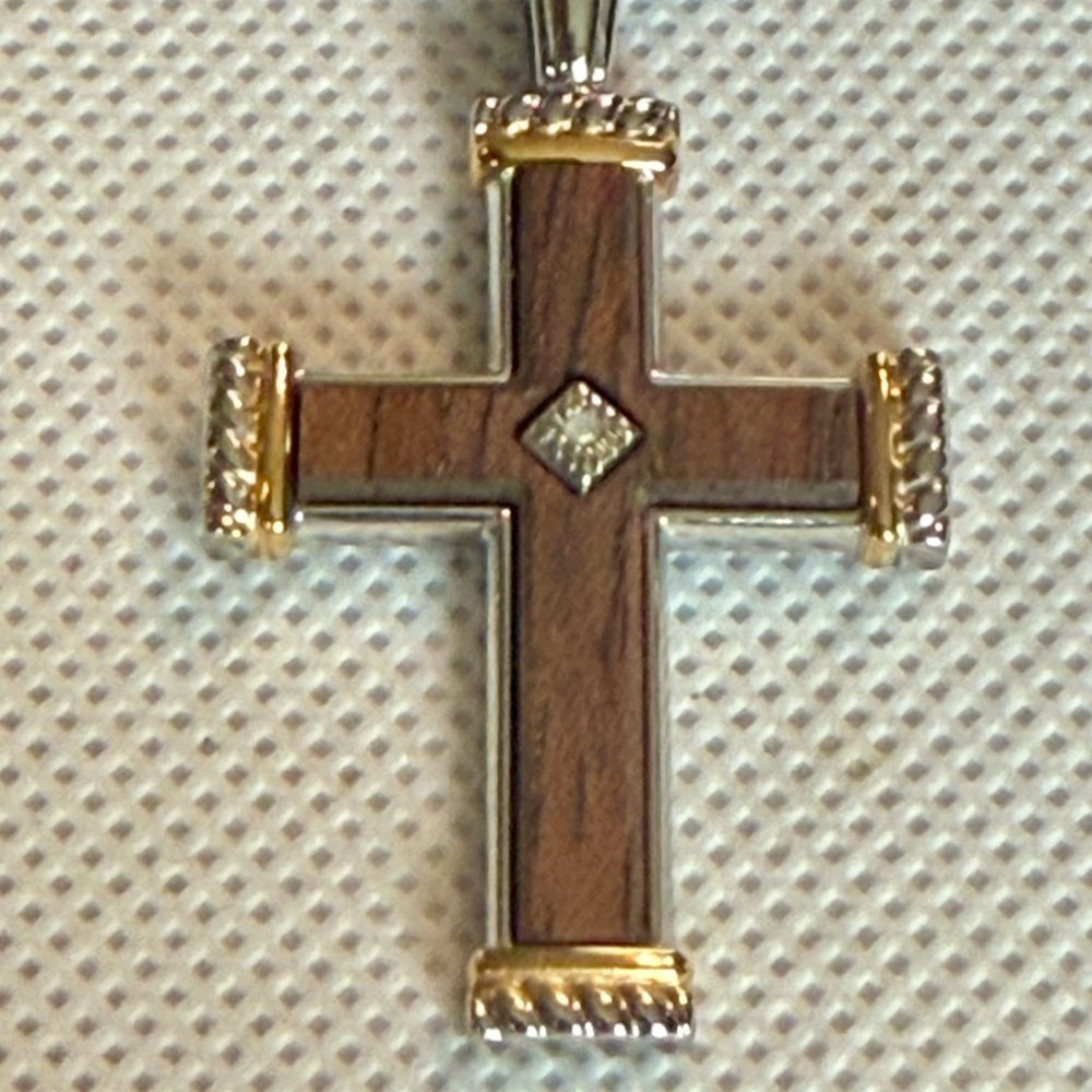 Elegant Gold and Silver Cross Pendant